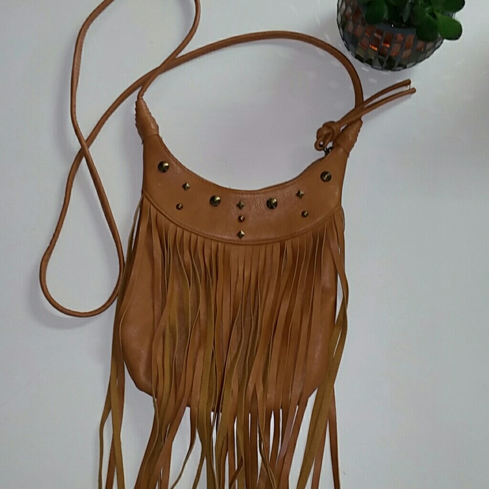 Leather studded and tassel crossbody purse